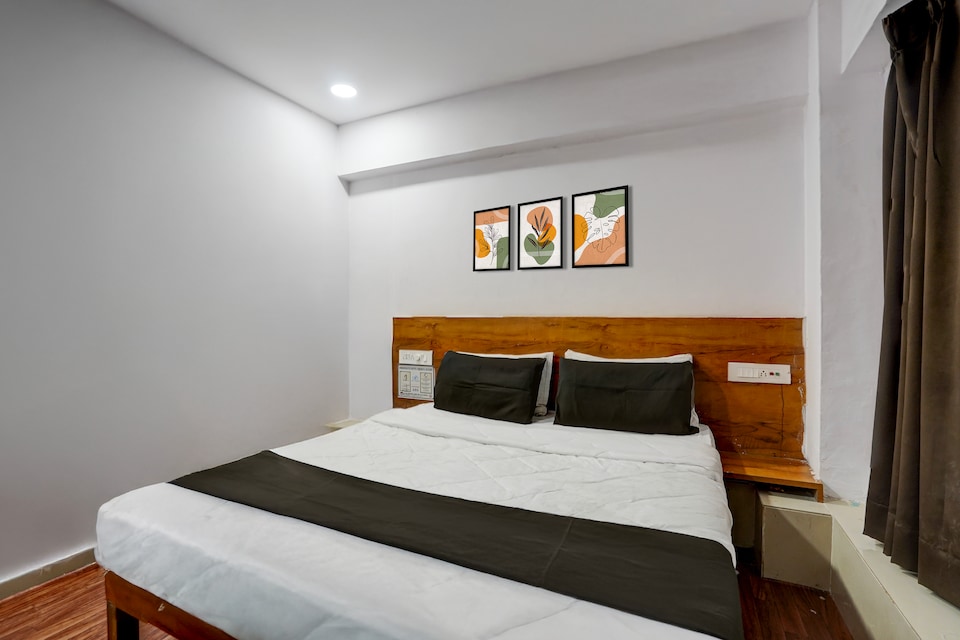 Hotel O RTO Office Surat Formerly Krishna Rooms, Adajan, Surat