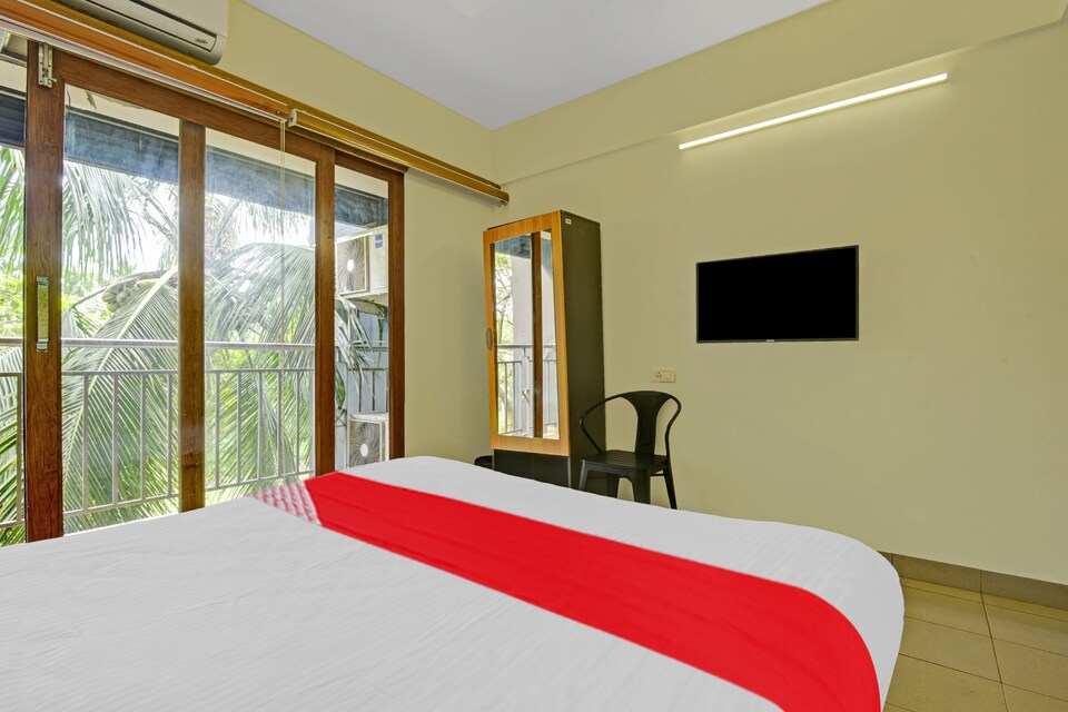 OYO Flagship 804582 Hotel Happy Rooms, Calicut City, Calicut