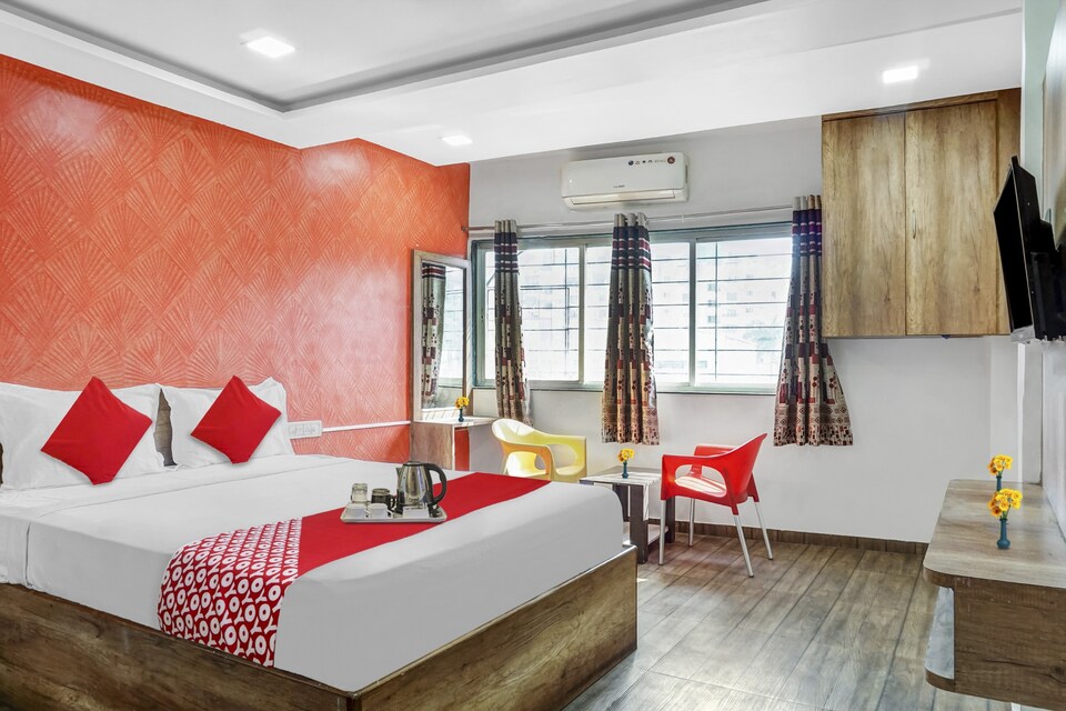 OYO Flagship Srushti Inn Near Fun Time Multiplex, Katraj Khed Shivapur Pune, Pune