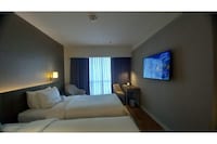 Capital O 950 AHM Suites at ACQUA
