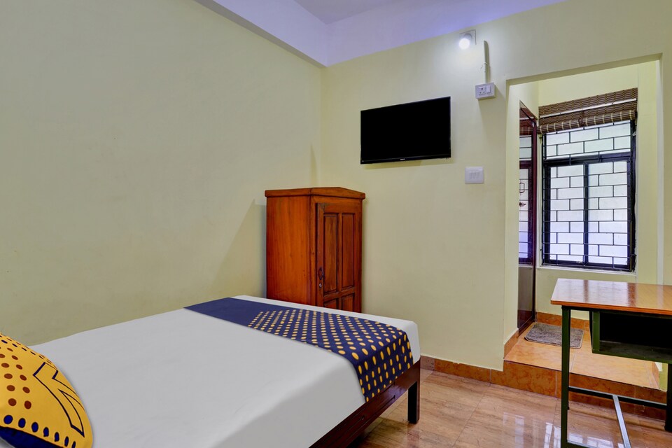 SPOT ON 812308 J Square, Thampanoor Trivandrum, Trivandrum