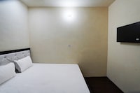 SPOT ON Happy Times Hotel