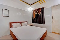 Hotel O Surya Dev Green Land Chokdi