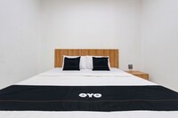 Capital O 93266 Palmier Hotel