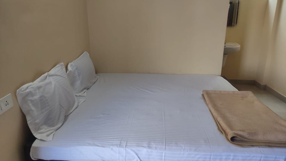 OYO 819958 Sree Yamuna Tourist Home, Thampanoor Trivandrum, Trivandrum