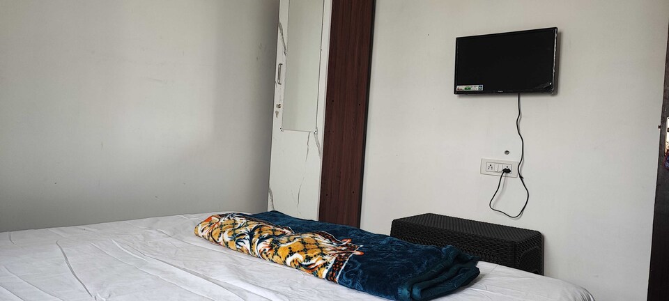 OYO 820770 RV Ruthra Lodge, Udumalpet, Udumalpet