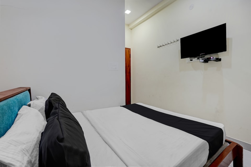 SPOT ON CHAMUNDESHWARI COMFORT, Rajajinagar Bangalore, Bangalore