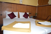 OYO Mallika Residency, near US Consulate.