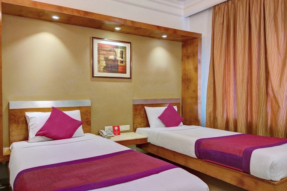 Capital O 422 SURAKSHA INN, Indiranagar Bangalore, Bangalore