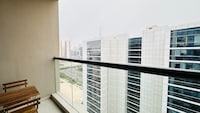 Upscale Apartment at Oval Tower Near Downtown with Balcony and Parking by Belvilla
