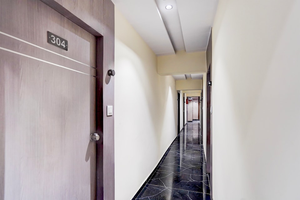 Hotel O Surbhi Inn Ambli Road Railway station, SG Highway Ahmedabad, Ahmedabad