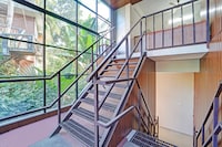 Hotel O Ambalamedu Puthenkurish Road