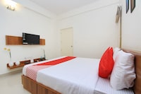 OYO Queen's Castle Near Sandhya Digital 4k Theatre