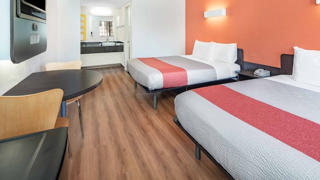 2 Full Beds | ADA/RI Shower/Mini Fridge