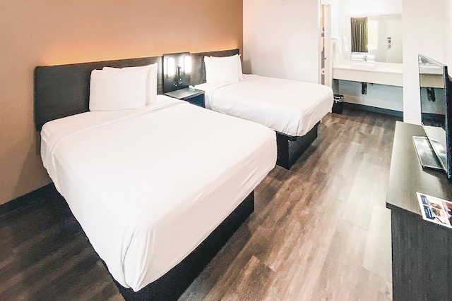 2 Full Beds | Mini Fridge