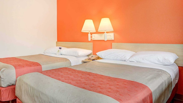 2 Full Beds | Mini Fridge