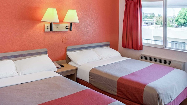 2 Full Beds | Mini Fridge