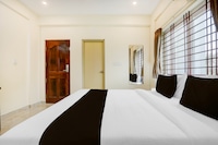 Super Hotel O PANVITH SUITES near Bangalore International Airport