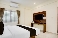 Super Hotel O PANVITH SUITES near Bangalore International Airport