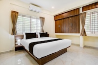 Super Hotel O PANVITH SUITES near Bangalore International Airport