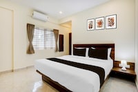 Super Hotel O PANVITH SUITES near Bangalore International Airport