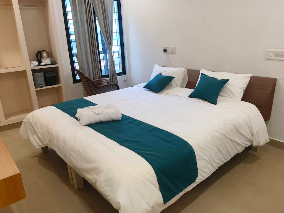 Hotel O JLN Stadium Ernakulam Formerly Peediyal Tower, Kaloor Kochi, Kochi