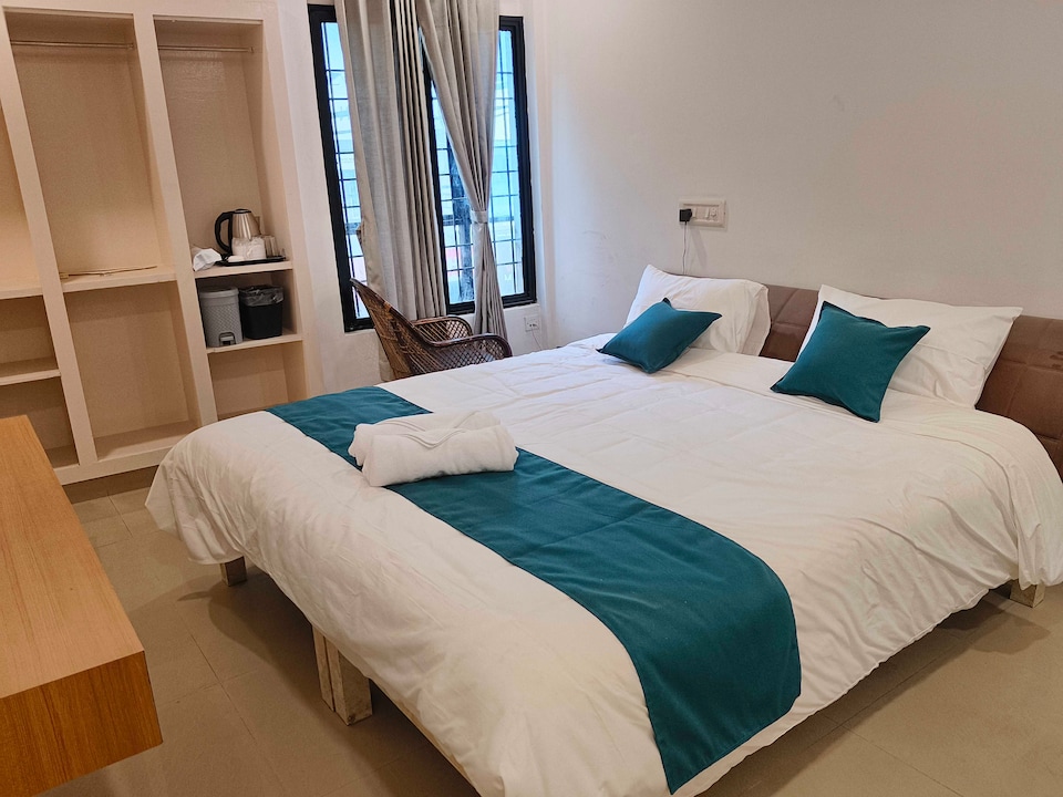 Hotel O JLN Stadium Ernakulam Formerly Peediyal Tower, Kaloor Kochi, Kochi