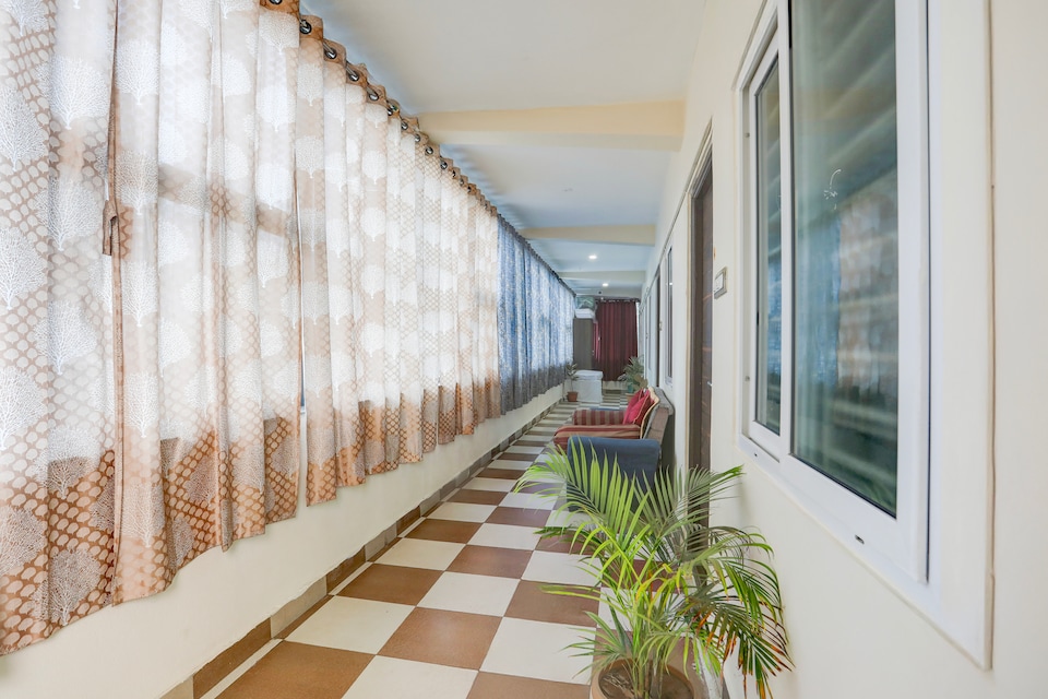 Hotel O Aqua Comforts, Airport Road Bangalore, Bangalore