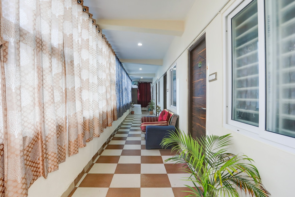 Hotel O Aqua Comforts, Airport Road Bangalore, Bangalore