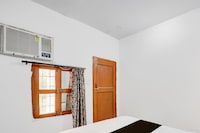 Hotel O Flagship Siddharth Hotel Yamuna Vihar C Block Stand