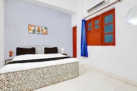 Hotel O East of Kailash Near Kailash Colony Metro Station