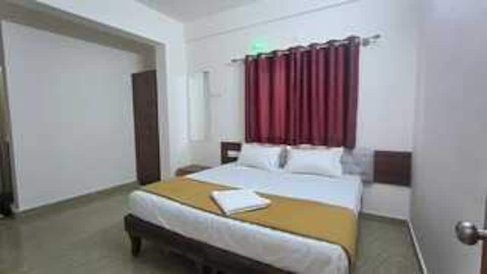 Collection O Jakksandra Harsha Boarding, Majestic Bangalore, Bangalore