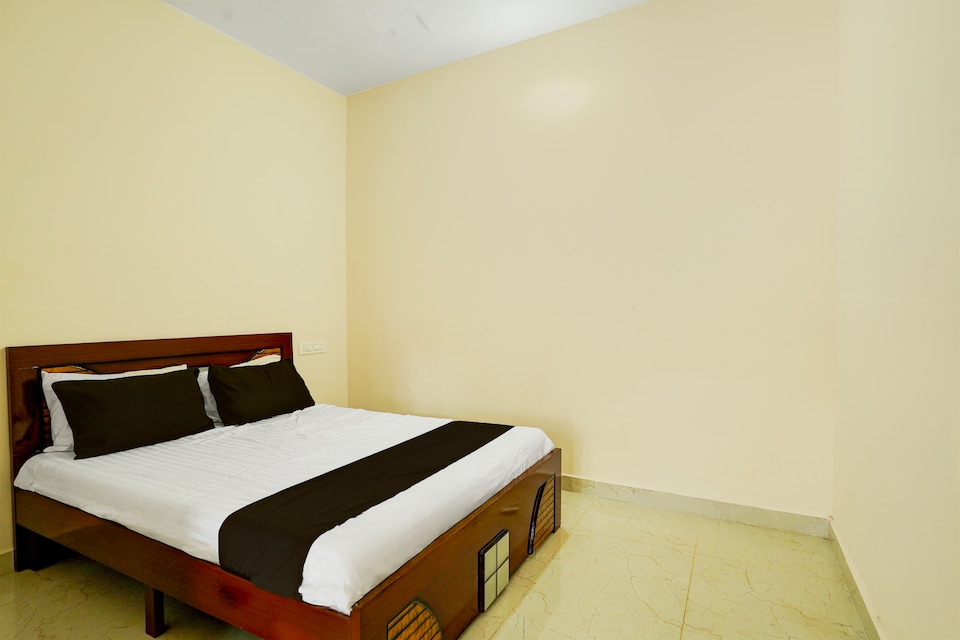 SPOT ON Mango Leaf Restaurant, Airport Road Bangalore, Bangalore