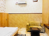 SPOT ON TIRMURTI RESTAURANT & GUEST HOUSE 