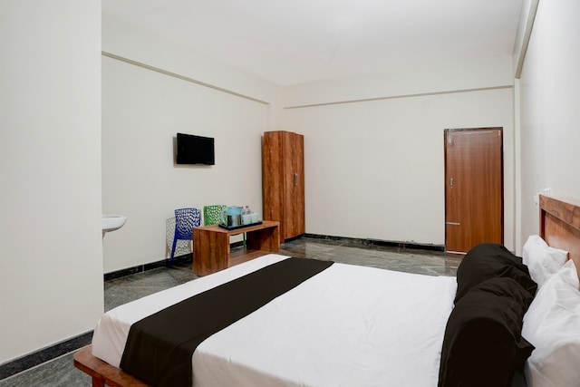 Hotel O Jodi Sri Muneshwara Swamy Temple