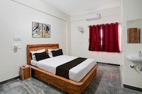Hotel O Jodi Sri Muneshwara Swamy Temple