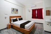 Hotel O Jodi Sri Muneshwara Swamy Temple