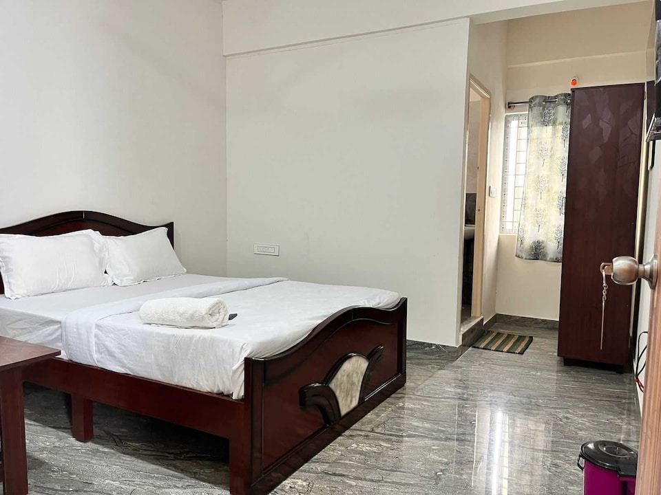 Hotel O Bhuvika Residency , Airport Road Bangalore, Bangalore