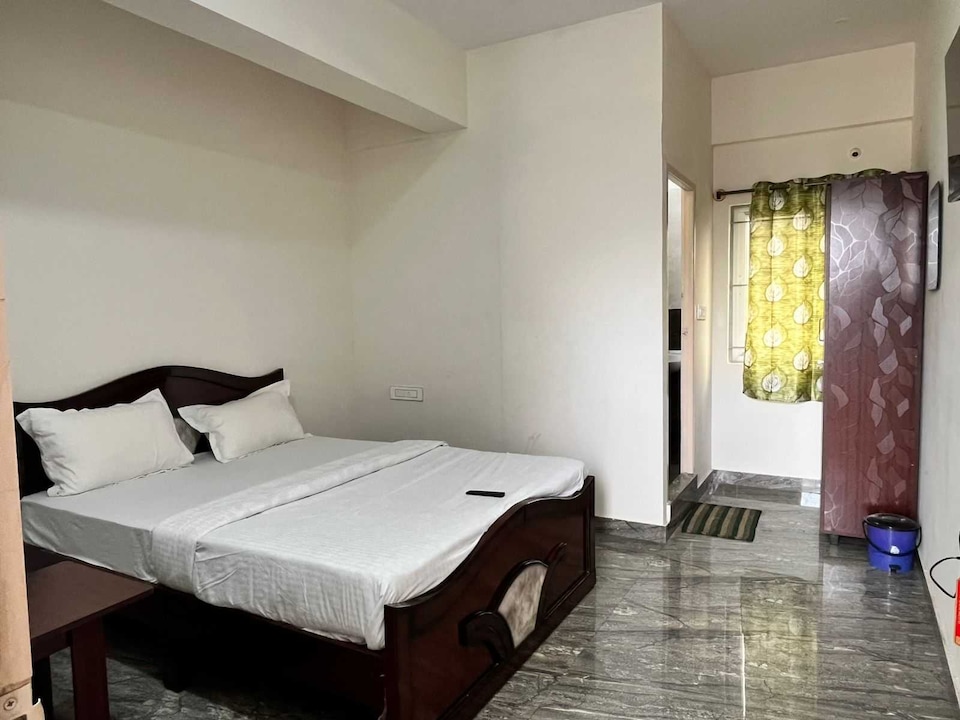 Hotel O Bhuvika Residency , Airport Road Bangalore, Bangalore
