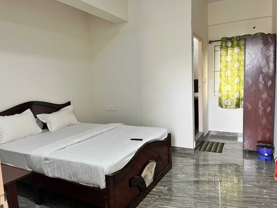 Hotel O Bhuvika Residency , Airport Road Bangalore, Bangalore