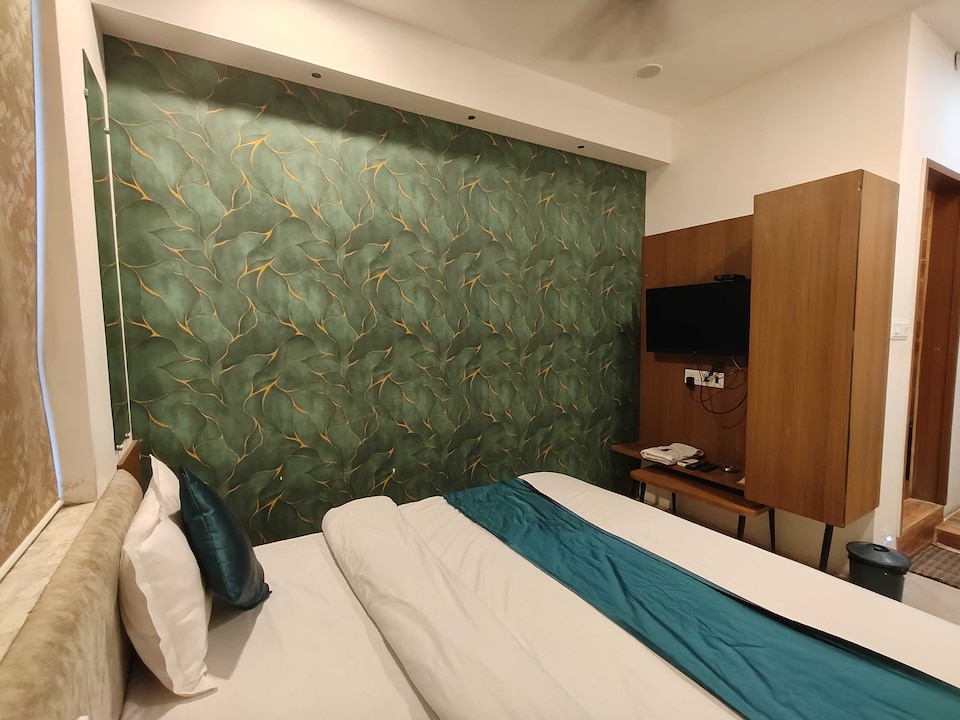 OYO Hotel O Hotel R Pacific , Dhebar Road, Rajkot