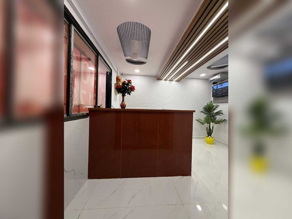 SPOT ON SBL HOTEL ROOMS, Textile Market Surat, Surat