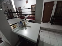 OYO 95096 Dewi Sudirman Guest House
