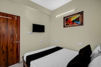 Hotel O KSR Guest Rooms