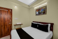 Hotel O KSR Guest Rooms