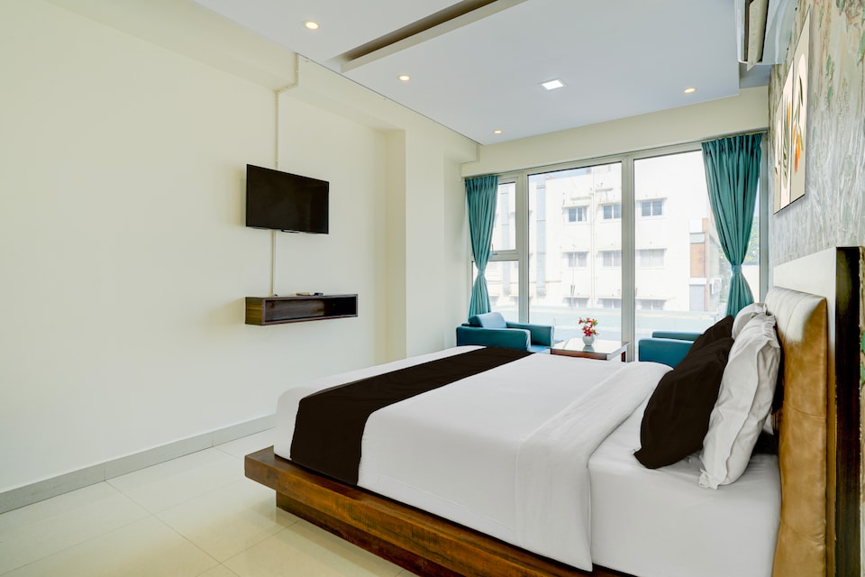 Hotel O Vaishnavi Suites, Airport Road Bangalore, बैंगलोर