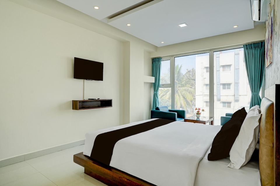 Hotel O Vaishnavi Suites, Airport Road Bangalore, बैंगलोर