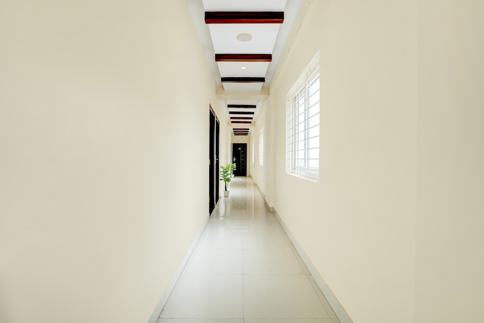 Hotel O Vaishnavi Suites, Airport Road Bangalore, Bangalore