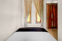 OYO 95170 Purnama Baru Syariah