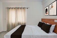 Hotel O SM Happy Stay ROOMS